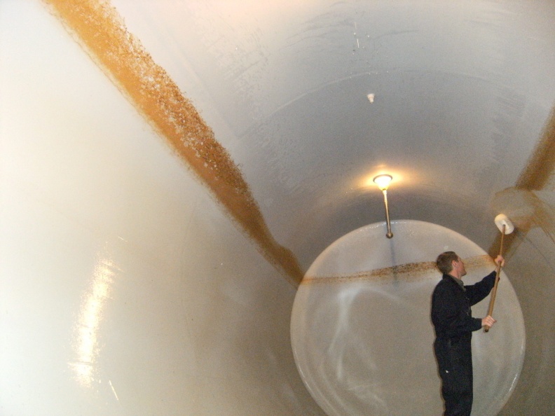 Strider cleaning the inside of a fermenting tank at the SPB_.jpg